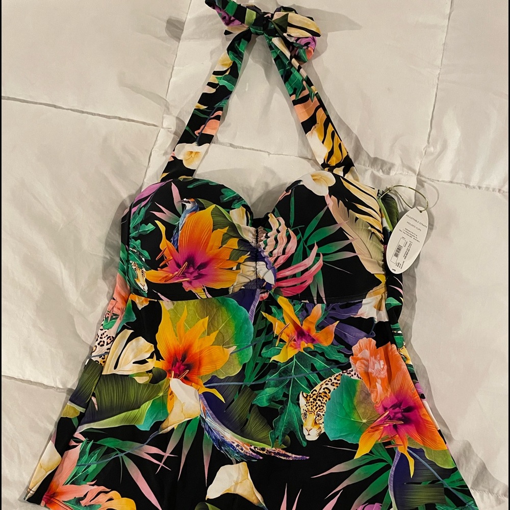 Beautiful NWT swim Tankini never worn bought online can’t return. Too big for me